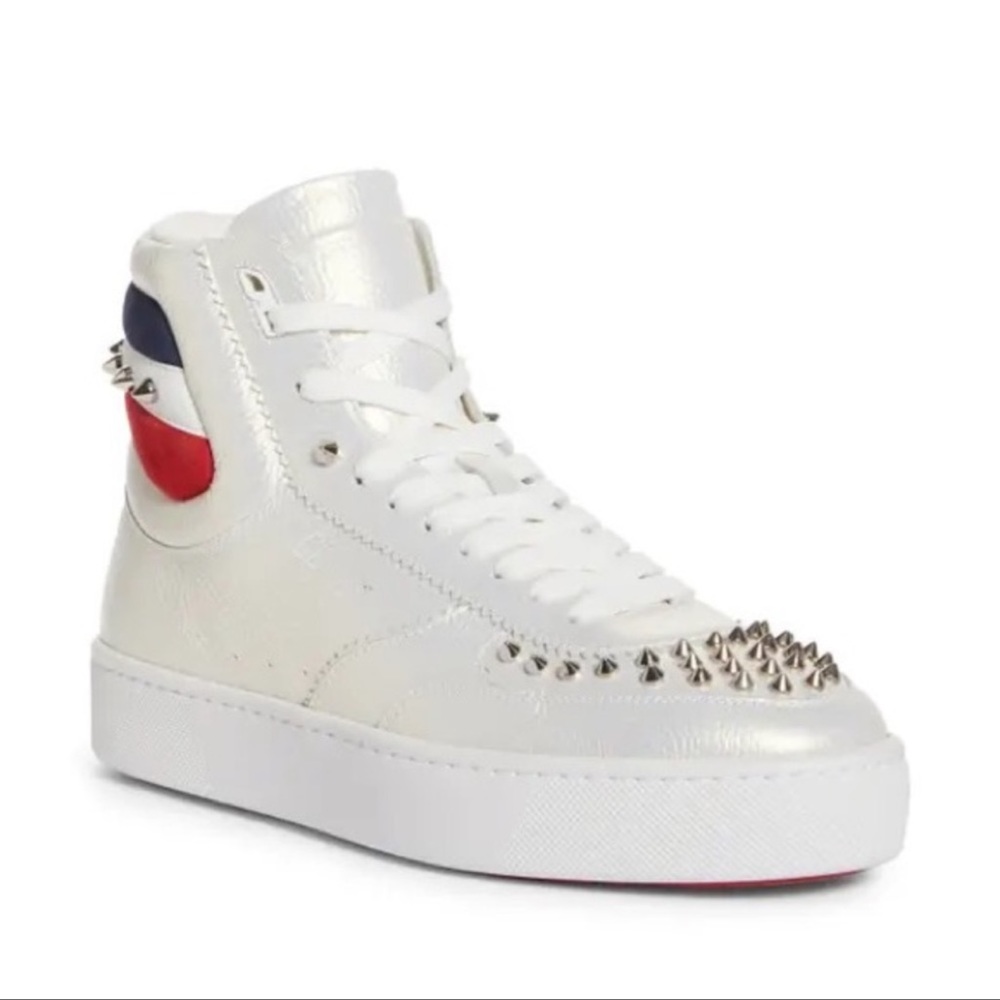 CHRISTIAN LOUBOUTIN
Top Rui Spikes High Top Sneaker In Champagne
